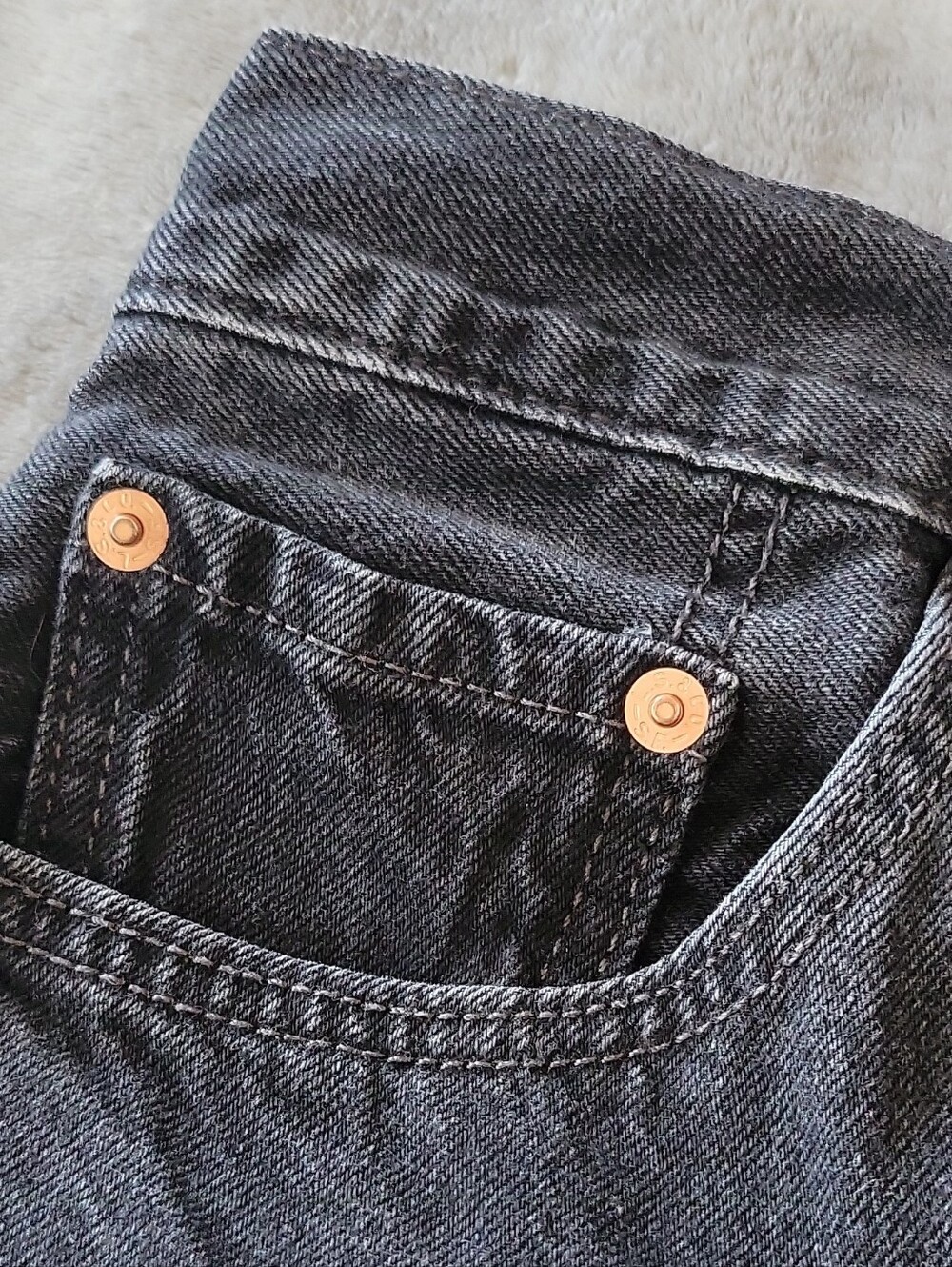 Levi's Women's High-Rise Black Denim Cutoff Shorts - Picture 6 of 12